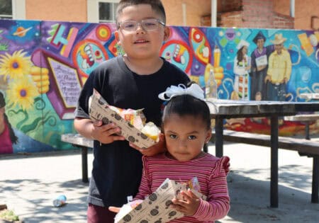 children with food outside