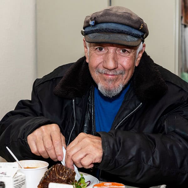 person sitting and eating dinner